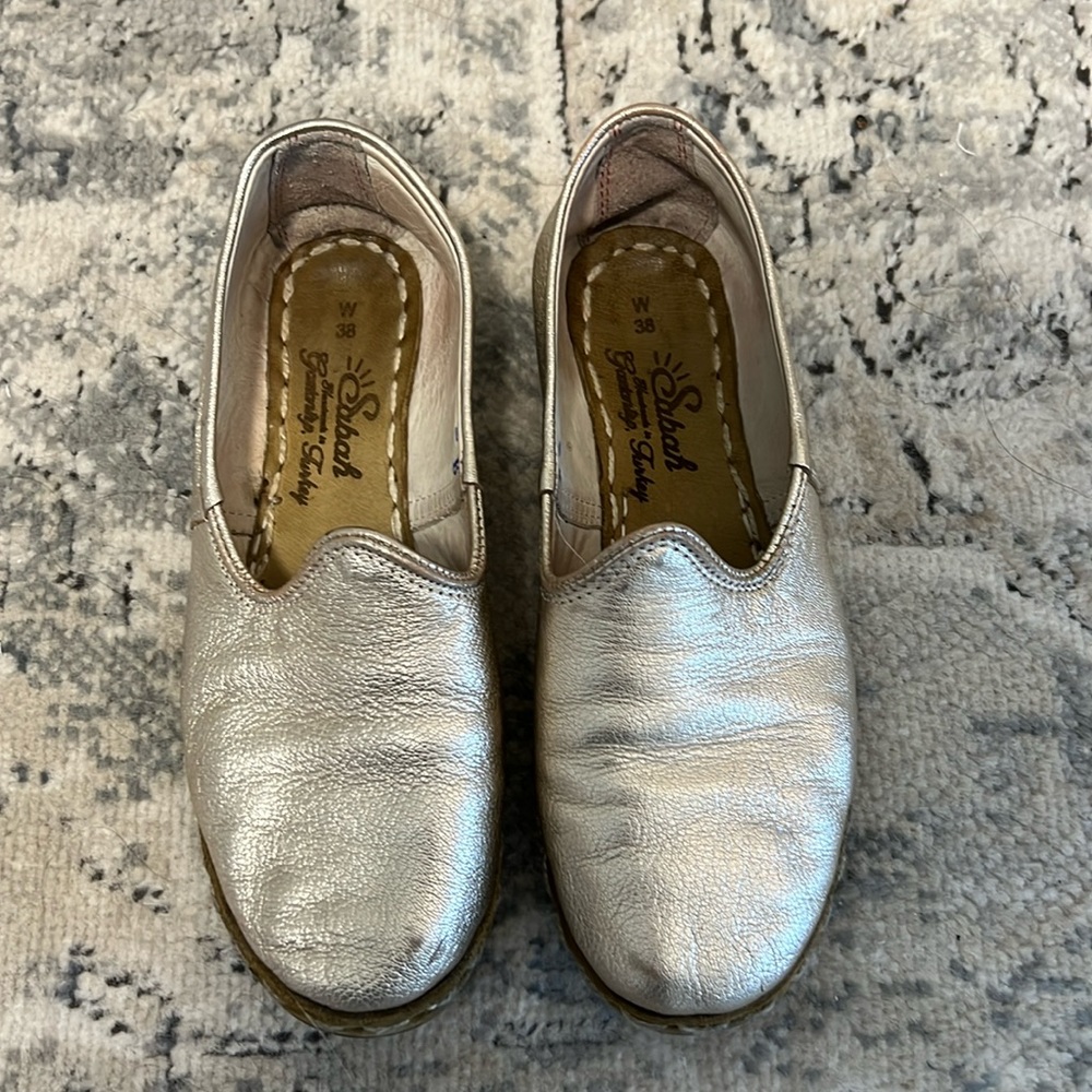 “Cin Cin” Sabah moccasins in champagne metallic leather